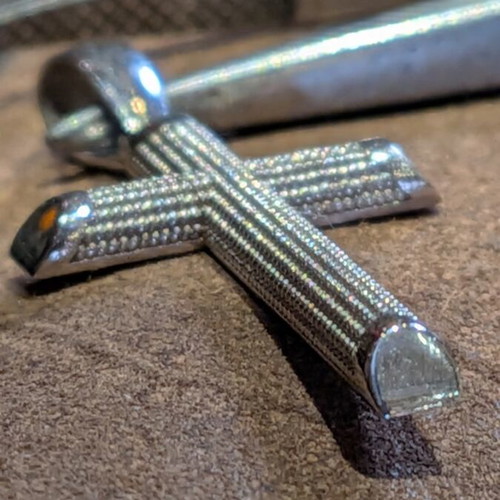 18K white gold cross pendant with embossed texture