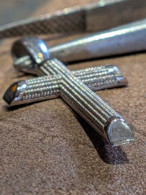 18K white gold cross pendant with embossed texture