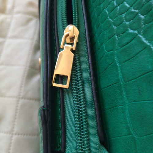 Women's bag new, green, with long removable strap and two inner pockets