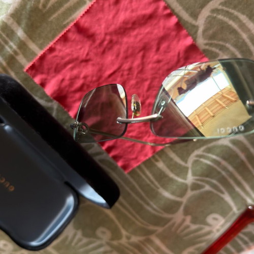 Gucci sunglasses with light blue lenses like new