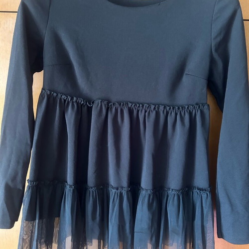 Women's blouse like new, black with tulle ruffles