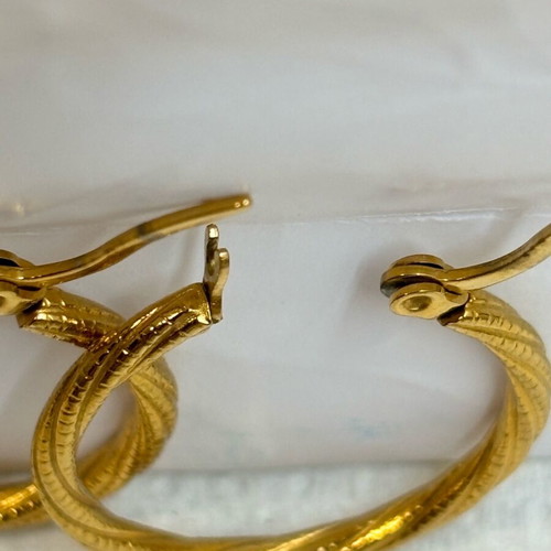 Iron golden rings with a twisted design.