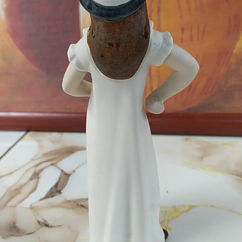 Porcelain figurine young handmade Rex Valencia like new