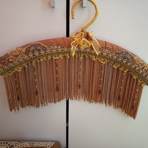 Vintage hanger and box in cinnamon orange color
