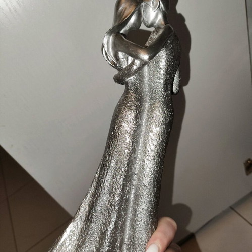 Decorative couple sculpture made of resin like new