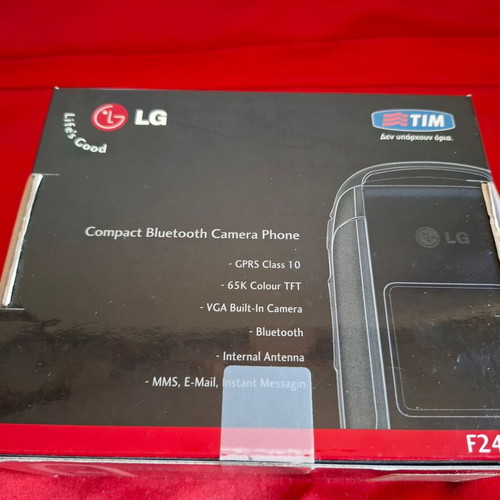LG F2400 mobile phone packaging like new with charger and manual