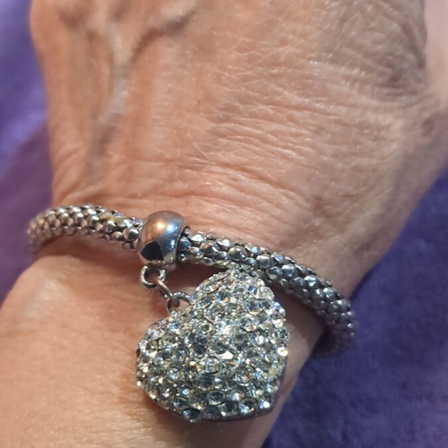 Elastic bracelet used with decorative silver heart charm