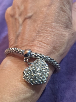 Elastic bracelet used with decorative silver heart charm
