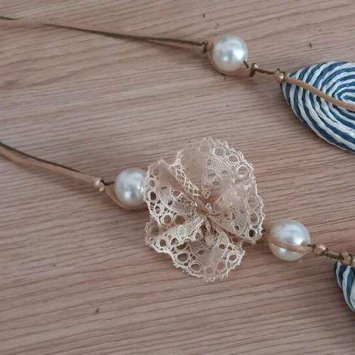 Women's necklace used handmade with pearls and cord