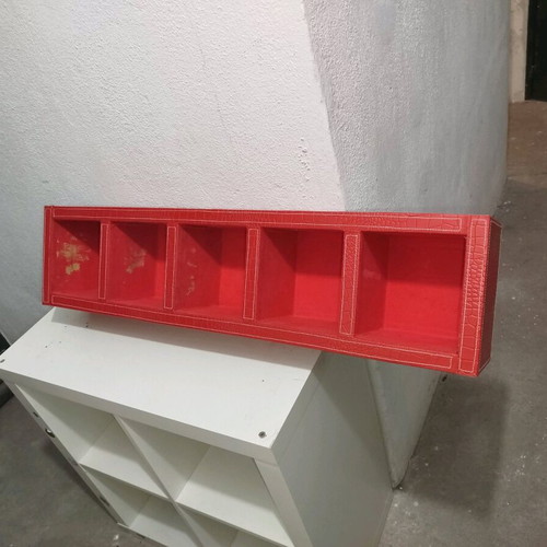 Shelf with red leather upholstery used, 5 compartments for CDs