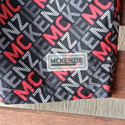 McKenzie Shorts Swimwear new, black with red print, size 12-13 years