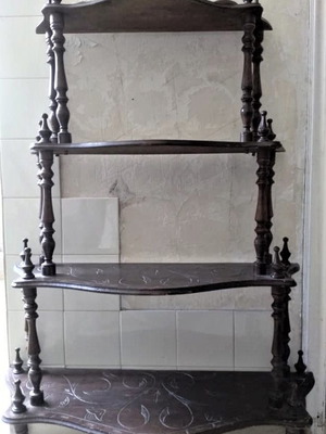 Wooden carved étagère with curved shelves