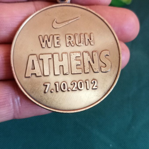 Nike We Run Athens 10K 2012 commemorative medal mint condition