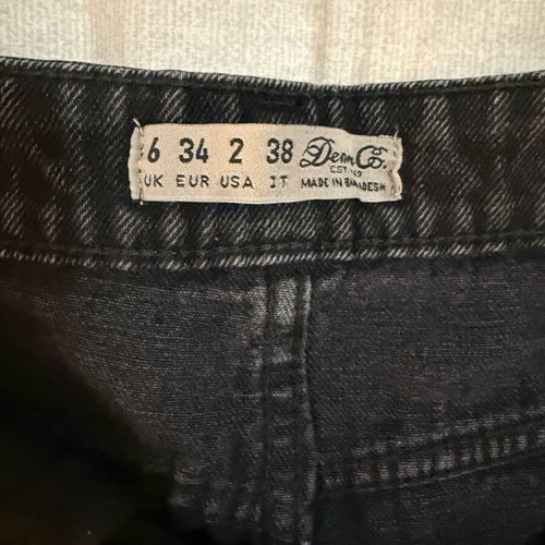 Primark black mini jean skirt used, size XS