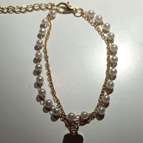 Bracelet new, white and gold-colored