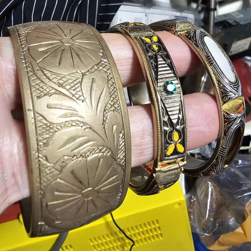 Vintage women's bracelet set used, one missing a stone