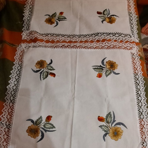 Embroidered tablecloths used, 2 pairs