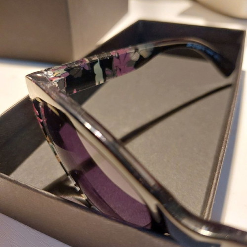 Sunglasses used with horn frame and purple UV protection lens