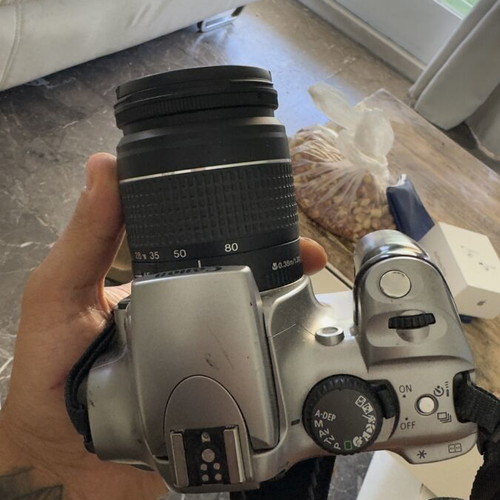 Canon EOS 300D camera with 28-80 lens and SD card used