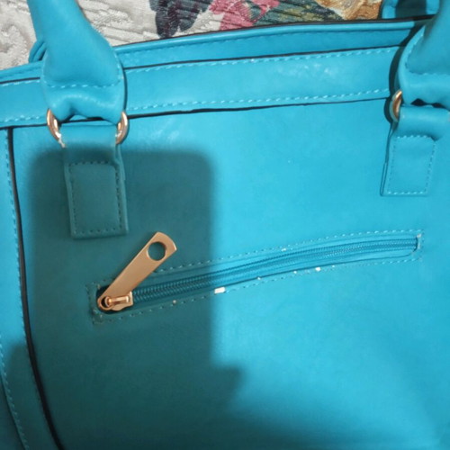 Bag with long strap with small signs of wear