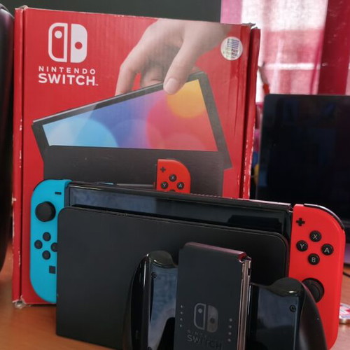 Nintendo Switch OLED console blue and red