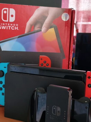 Nintendo Switch OLED console blue and red