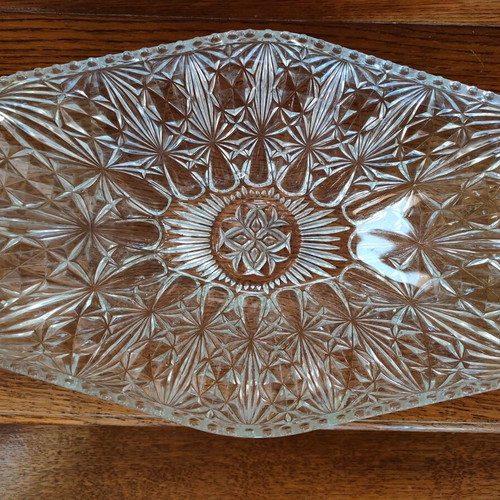Oval crystal or glass platter like new with embossed patterns