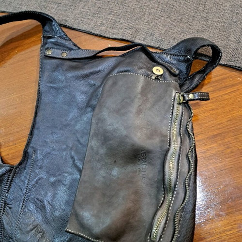 Italian leather backpack in dark brown, like new, minimal design