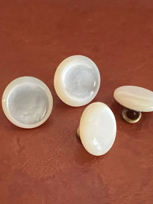 Set of 4 used vintage mother of perl buttons
