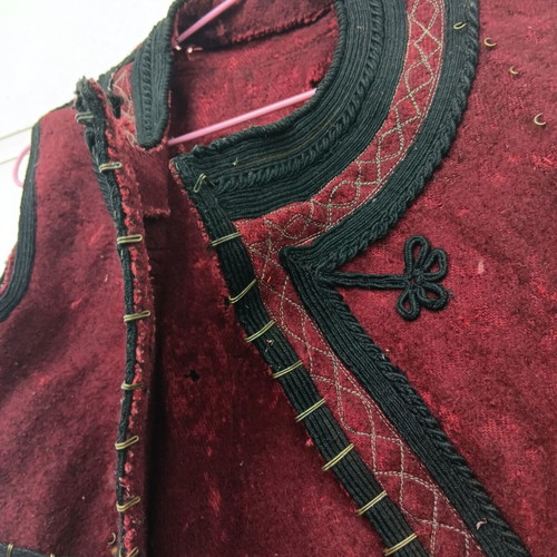 Collectible traditional woolen burgundy vest used