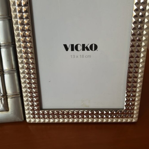 Set of 4 photo frames and 1 small album