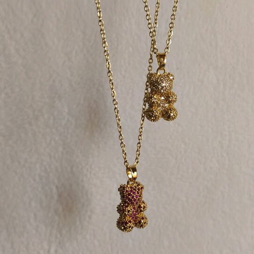 Teddy bear necklace gold color like new, sold together
