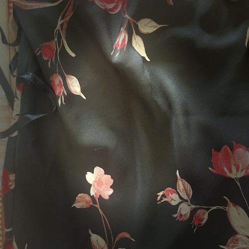 Black floral skirt with transparency medium, used