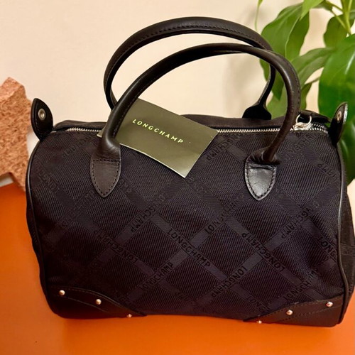Longchamp all black handbag like new with jacquard monogram and leather details