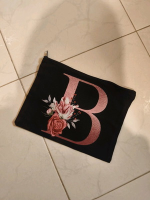 Toiletry bag-wallet new, black and pink
