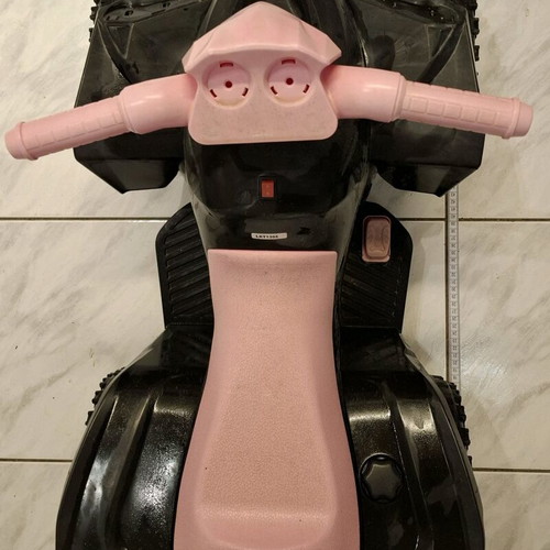Children's electric ATV like new, black with pink details