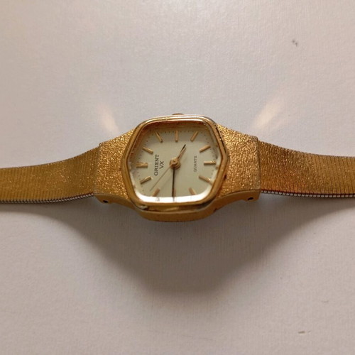 Orient vintage women's watch used, gold color, needs repair