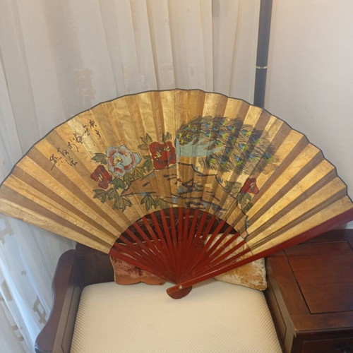 Large decorative Asian art wall fan with peacock feathers and peonies, vintage