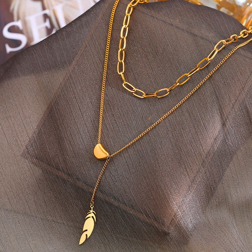 Feather necklace in gold color new stainless steel