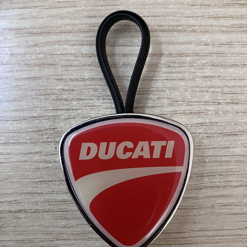 Ducati Official metal keychain with red and white enamel shield design
