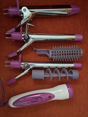 Babyliss curling iron with 5 attachments used