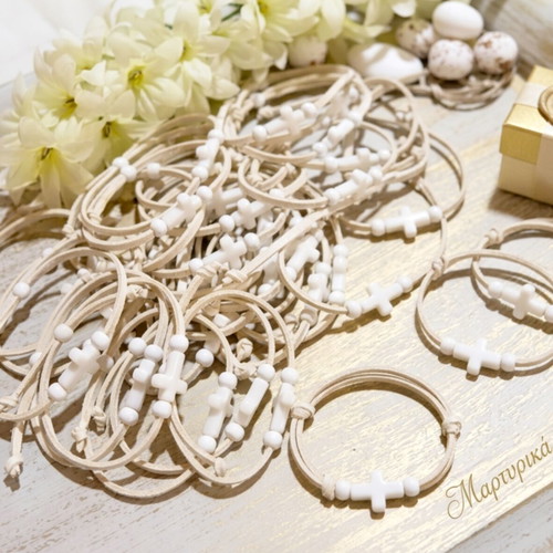 Handmade martyrika bracelets with suede cord and white cross
