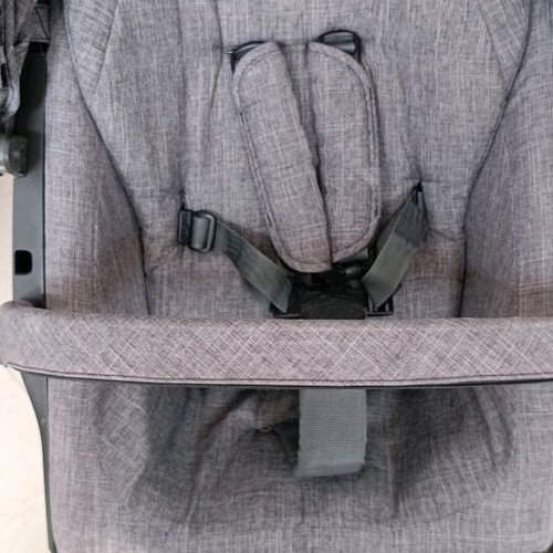 Stokke Xplory stroller used with mosquito net and rain cover
