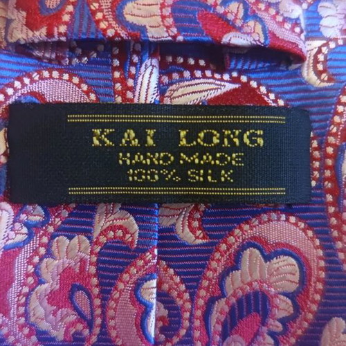 Silk tie new with unique paisley pattern, burgundy and blue