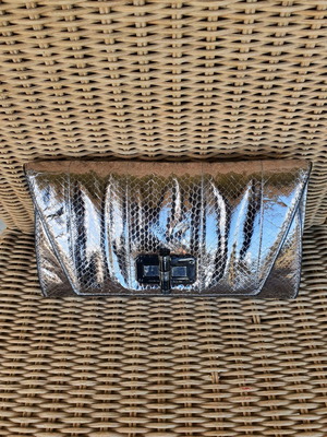 Embossed leather clutch like new, gray and silver