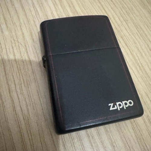 Zippo lighter with red stripe, like new, needs refill and flint