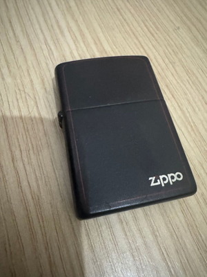 Zippo lighter with red stripe, like new, needs refill and flint
