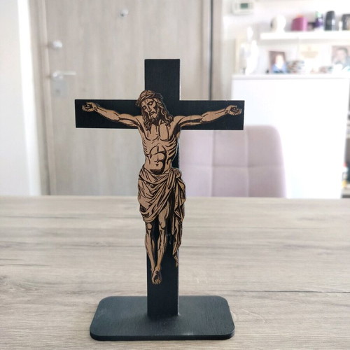 Handmade cross with embossed Jesus figure on laser cut wood