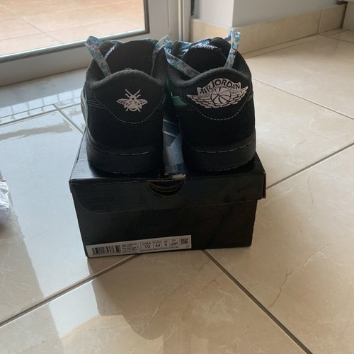 Nike Air Jordan black sneakers with floral laces