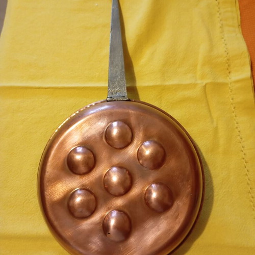 Vintage copper egg pan with 7 slots used